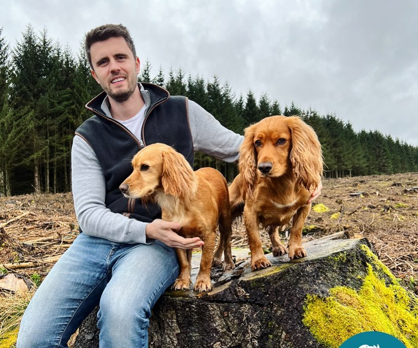 Alex Hirst with two cocker spaniels